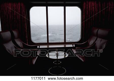 View of Pacific Ocean through the window of lounge area on a passenger ship View Large Photo Image Stock Image - View of Pacific Ocean through the window of lounge area on a passenger ship. Fotosearch