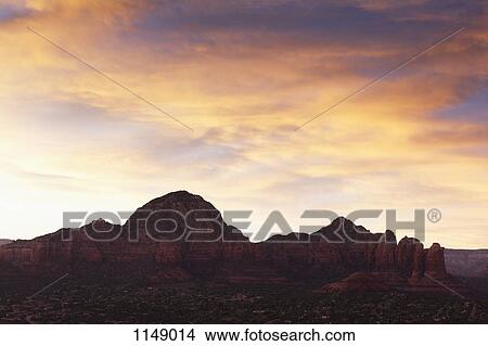 View of rock formations in a desert at sunset, Sedona, Arizona, USA View Large Photo Image Picture - View of rock formations in a desert at sunset, Sedona, Arizona, USA. Fotosearch