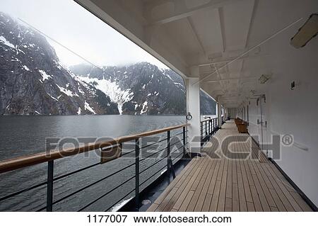 View of Tracy Arm fjord from the walkway of a passenger ship, Alaska View Large Photo Image Stock Photo - View of Tracy Arm fjord from the walkway of a passenger ship, Alaska. Fotosearch