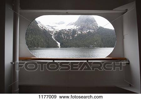 View of Tracy Arm fjord through the window of a passenger ship, Alaska View Large Photo Image Stock Photo - View of Tracy Arm fjord through the window of a passenger ship, Alaska. Fotosearch