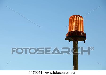 Warning light with blue background of sky View Large Photo Image Stock Image - Warning light with blue background of sky. Fotosearch