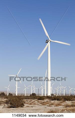 Wind turbines in a desert landscape View Large Photo Image Picture - Wind turbines in a desert landscape. Fotosearch
