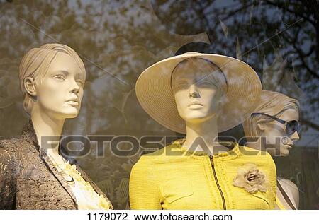 Window display of mannequins with reflection of trees View Large Photo Image Stock Image - Window display of mannequins with reflection of trees. Fotosearch
