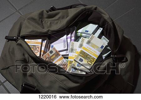 Stock Photograph - A bag full of large billed Euro banknotes. Fotosearch