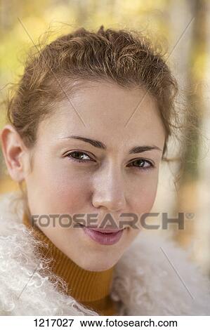 A beautiful woman wearing a fake fur collar View Large Photo Image Stock Photo - A beautiful woman wearing a fake fur collar. Fotosearch