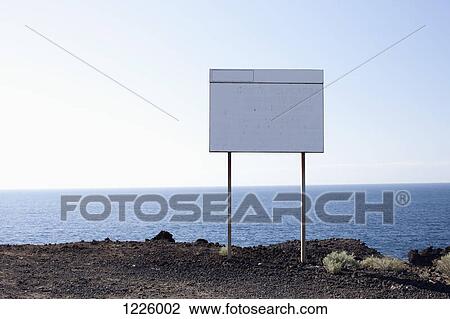 A blank billboard next to the sea View Large Photo Image Stock Image - A blank billboard next to the sea. Fotosearch
