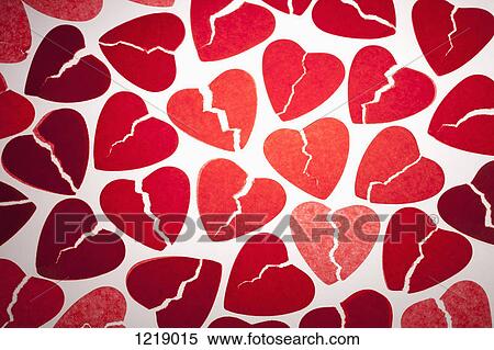 Stock Photography - A bunch of red tissue paper broken hearts. Fotosearch