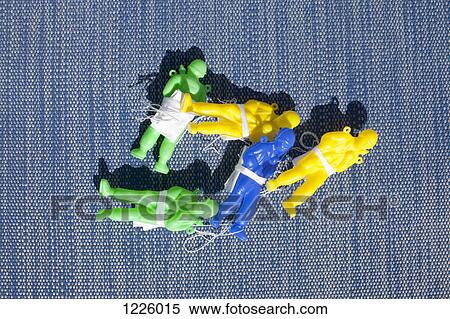 Stock Photography - A collection of plastic toy paratroopers. Fotosearch