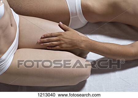 A couple in their underwear on a bed, close-up, midsection View Large Photo Image Stock Image - A couple in their underwear on a bed, close-up, midsection. Fotosearch