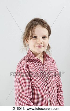 A girl looking serenely into the camera View Large Photo Image Stock Image - A girl looking serenely into the camera. Fotosearch