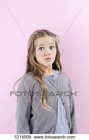 A girl with an expression of disbelief on her face View Large Photo Image Stock Photography - A girl with an expression of disbelief on her face. Fotosearch