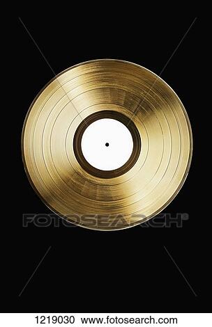 A gold record on a black background View Large Photo Image Stock Image - A gold record on a black background. Fotosearch
