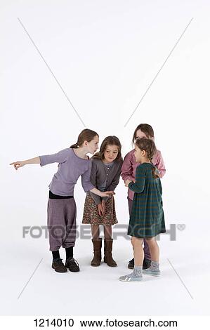 A group of gossiping little girls View Large Photo Image Stock Image - A group of gossiping little girls. Fotosearch