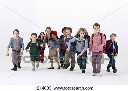A group of school kids wearing backpacks and running forward View Large Photo Image Stock Image - A group of school kids wearing backpacks and running forward. Fotosearch