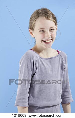 A happy girl laughing View Large Photo Image Stock Photo - A happy girl laughing. Fotosearch
