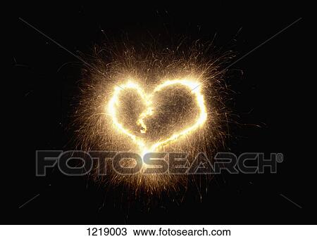 A heart shape drawn with a sparkler against a black background View Large Photo Image Stock Image - A heart shape drawn with a sparkler against a black background. Fotosearch
