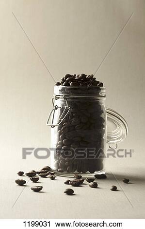 Stock Image - A jar of coffee beans. Fotosearch