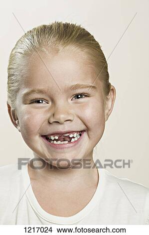 A laughing young girl View Large Photo Image Picture - A laughing young girl. Fotosearch
