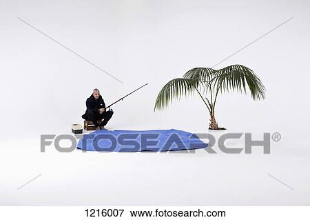 Stock Photo - A man pretend fishing in pretend water. Fotosearch