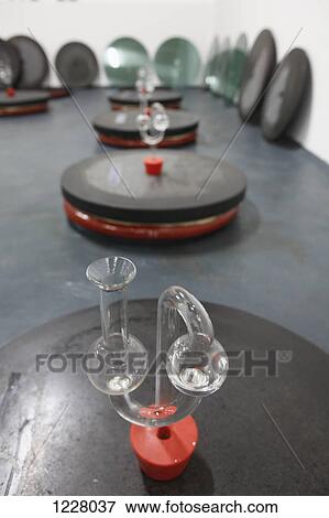 A mix of old and new, lab glassware on top of buried amphora fermenting wine View Large Photo Image Stock Photo - A mix of old and new, lab glassware on top of buried amphora fermenting wine . Fotosearch
