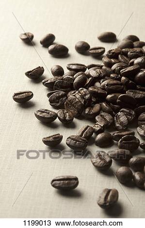 Stock Image - A pile of coffee beans. Fotosearch