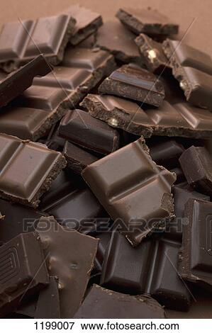 A pile of milk and dark chocolate View Large Photo Image Stock Photo - A pile of milk and dark chocolate. Fotosearch