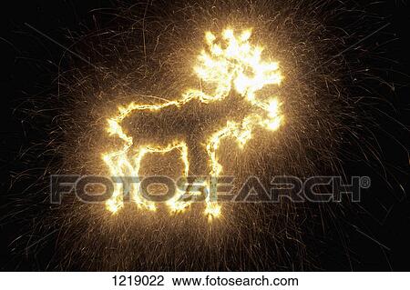 A reindeer drawn on a black background with a sparkler View Large Photo Image Stock Image - A reindeer drawn on a black background with a sparkler. Fotosearch