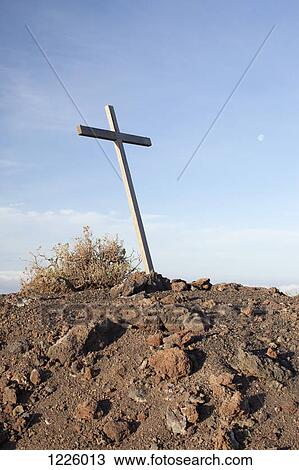 A simple wood cross on a rocky hilltop View Large Photo Image Stock Image - A simple wood cross on a rocky hilltop. Fotosearch