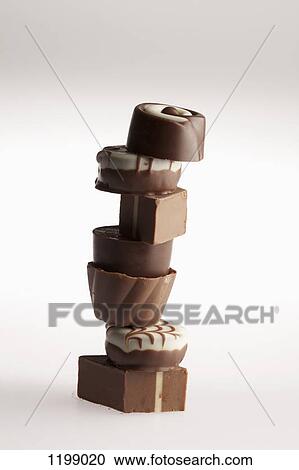 A stack of chocolates View Large Photo Image Stock Image - A stack of chocolates. Fotosearch