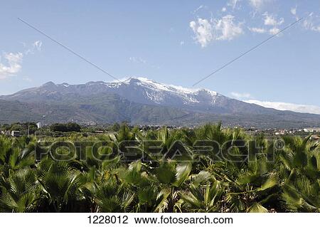 Stock Image - A view of Mt Etna, a volcanic mountain in Sicily, Italy. Fotosearch
