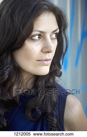 A woman staring away in contemplation View Large Photo Image Stock Photography - A woman staring away in contemplation. Fotosearch