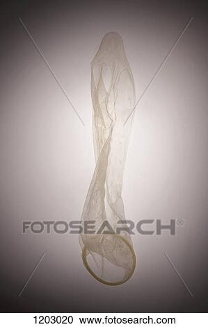 An empty used condom seen from above View Large Photo Image Stock Image - An empty used condom seen from above. Fotosearch