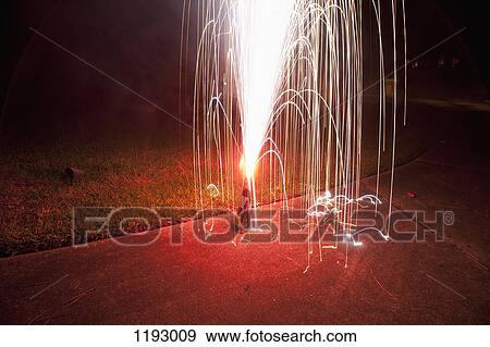 An ignited firework View Large Photo Image Stock Photo - An ignited firework. Fotosearch