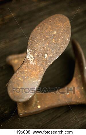 An old metal shoemakers tool View Large Photo Image Stock Photo - An old metal shoemakers tool. Fotosearch