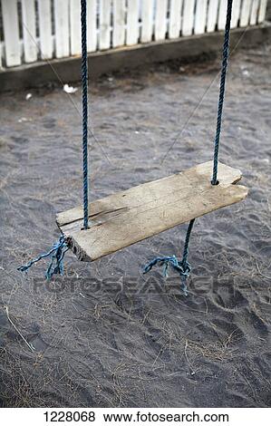 An old weathered wood swing, close-up, high angle view View Large Photo Image Stock Photo - An old weathered wood swing, close-up, high angle view. Fotosearch