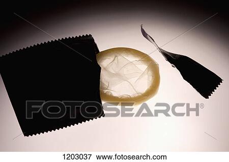 An opened condom wrapper with an unused condom View Large Photo Image Stock Photo - An opened condom wrapper with an unused condom. Fotosearch