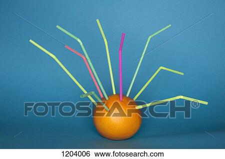 An orange with a bunch of drinking straws stuck into it View Large Photo Image Stock Photograph - An orange with a bunch of drinking straws stuck into it. Fotosearch