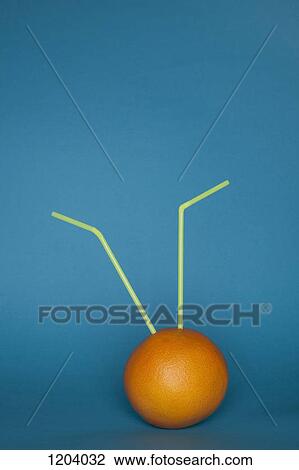 An orange with two drinking straws stuck into it View Large Photo Image Stock Image - An orange with two drinking straws stuck into it. Fotosearch