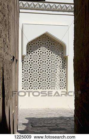 Arabesque lattice window in Dubai, United Arab Emirates View Large Photo Image Stock Photo - Arabesque lattice window in Dubai, United Arab Emirates. Fotosearch