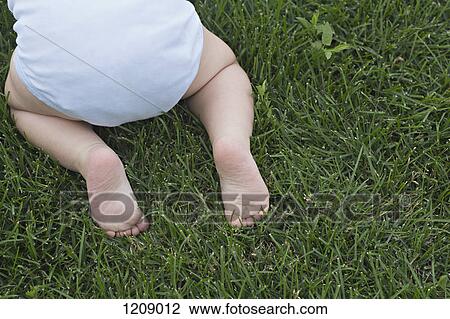 Baby in garden View Large Photo Image Stock Image - Baby in garden. Fotosearch