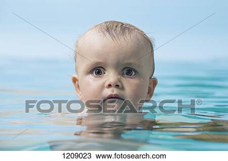 Stock Image - Baby in water. Fotosearch