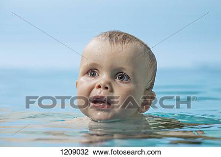Baby in water View Large Photo Image Stock Image - Baby in water. Fotosearch