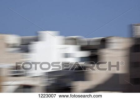 Stock Photo - Blurred buildings. Fotosearch