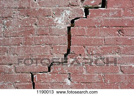 Close-up of a crack running through a red brick wall View Large Photo Image Stock Image - Close-up of a crack running through a red brick wall. Fotosearch