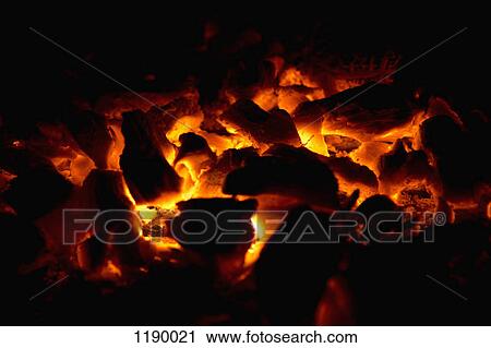 Stock Image - Close-up of glowing embers. Fotosearch