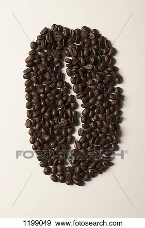 Coffee beans arranged in the shape of a large coffee bean View Large Photo Image Stock Photo - Coffee beans arranged in the shape of a large coffee bean. Fotosearch