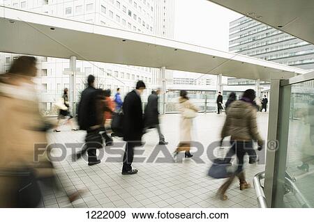 Stock Photo - Commuters on the move. Fotosearch