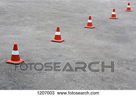 Stock Image - Cones on tarmac. Fotosearch