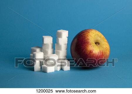 Contrast of apple and sugar cubes View Large Photo Image Stock Photography - Contrast of apple and sugar cubes. Fotosearch