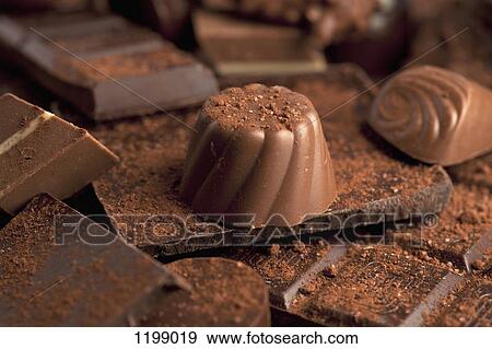 Stock Photo - Detail of a pile of chocolates. Fotosearch